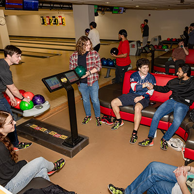 Students bowling at TerpZone during Find Your Squad event