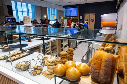 Assorted breads, bagels, and pastries on display at the Panera Bread in Stamp Student Union.