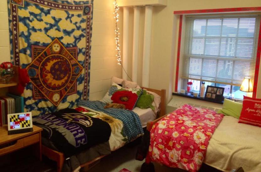 double room with beds arranged in an L-shape