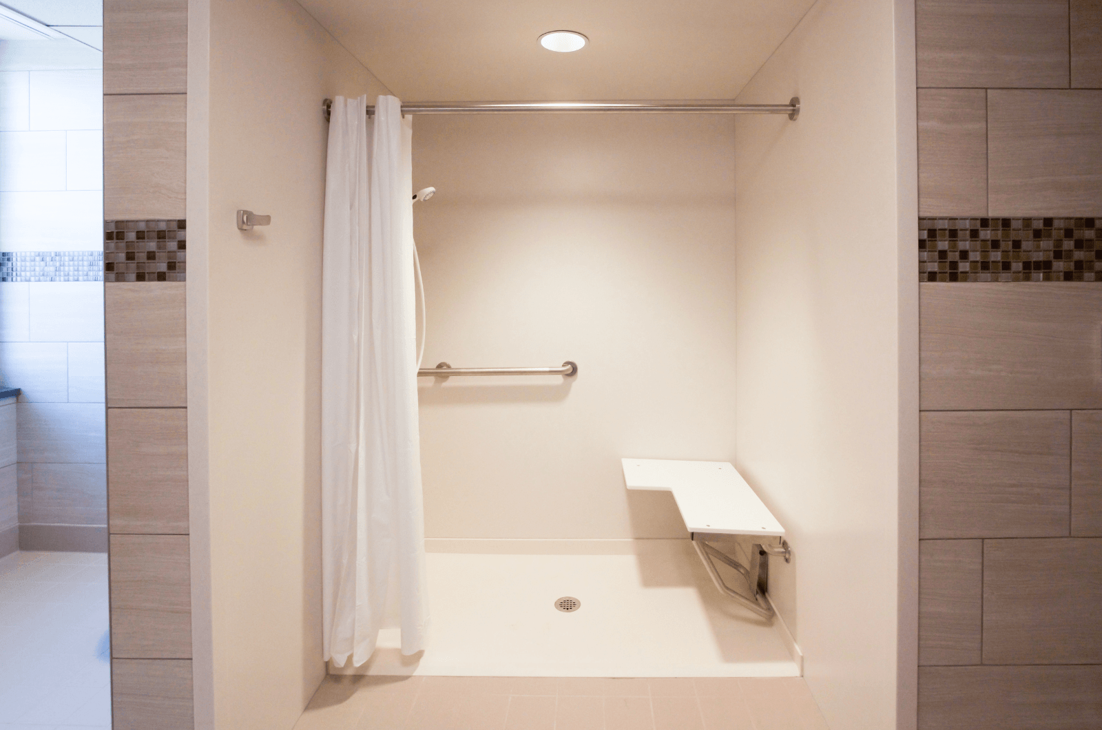 inside bathroom with wheelchair accessible shower