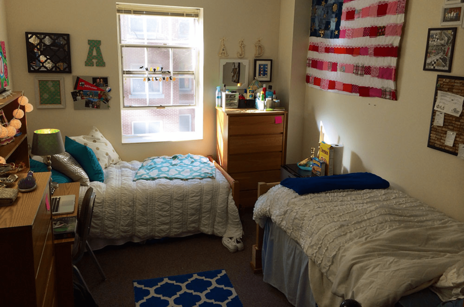 double room with beds arranged in an L-shape