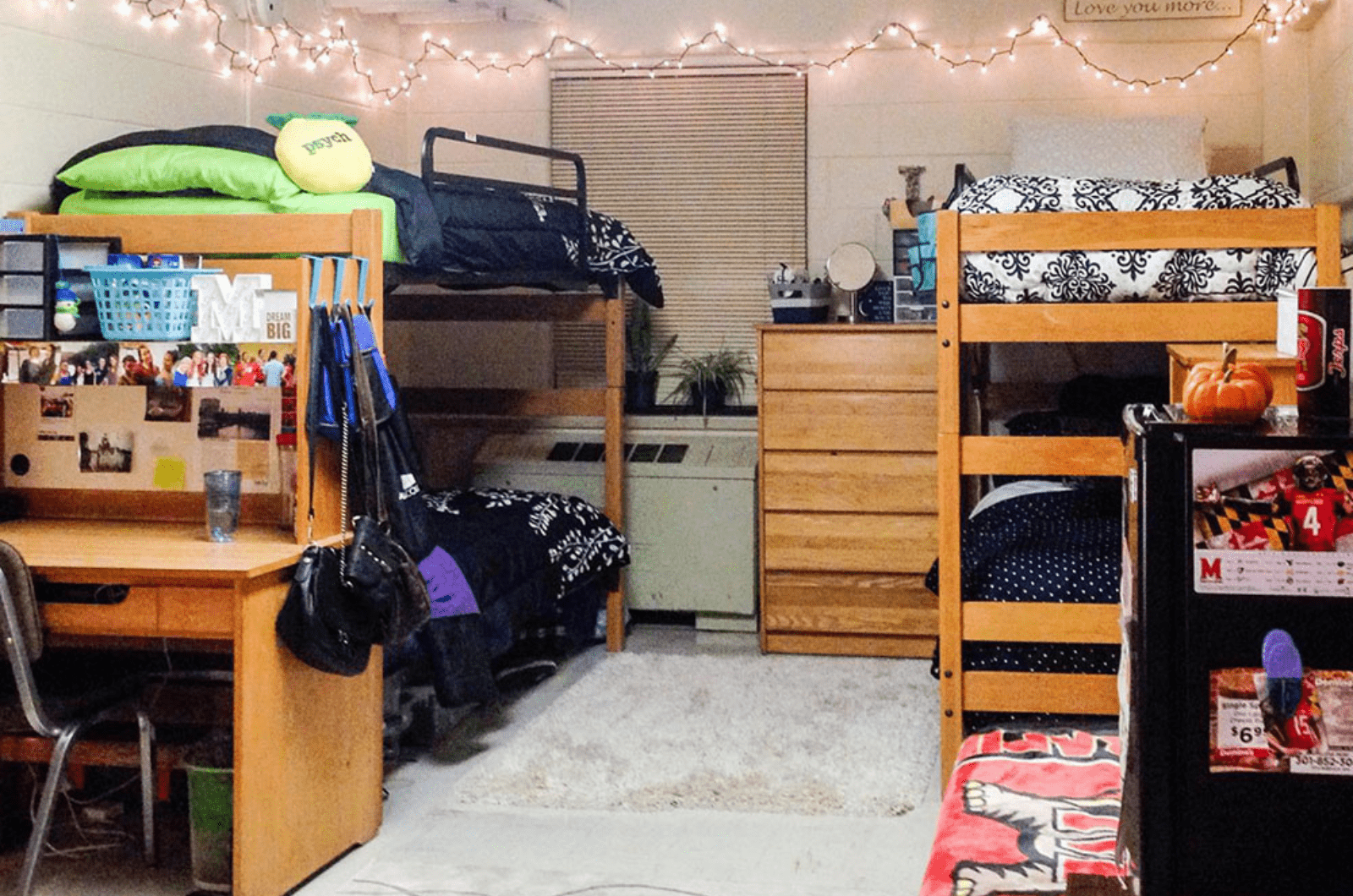 quad room with two bunk beds and a desk in the foreground