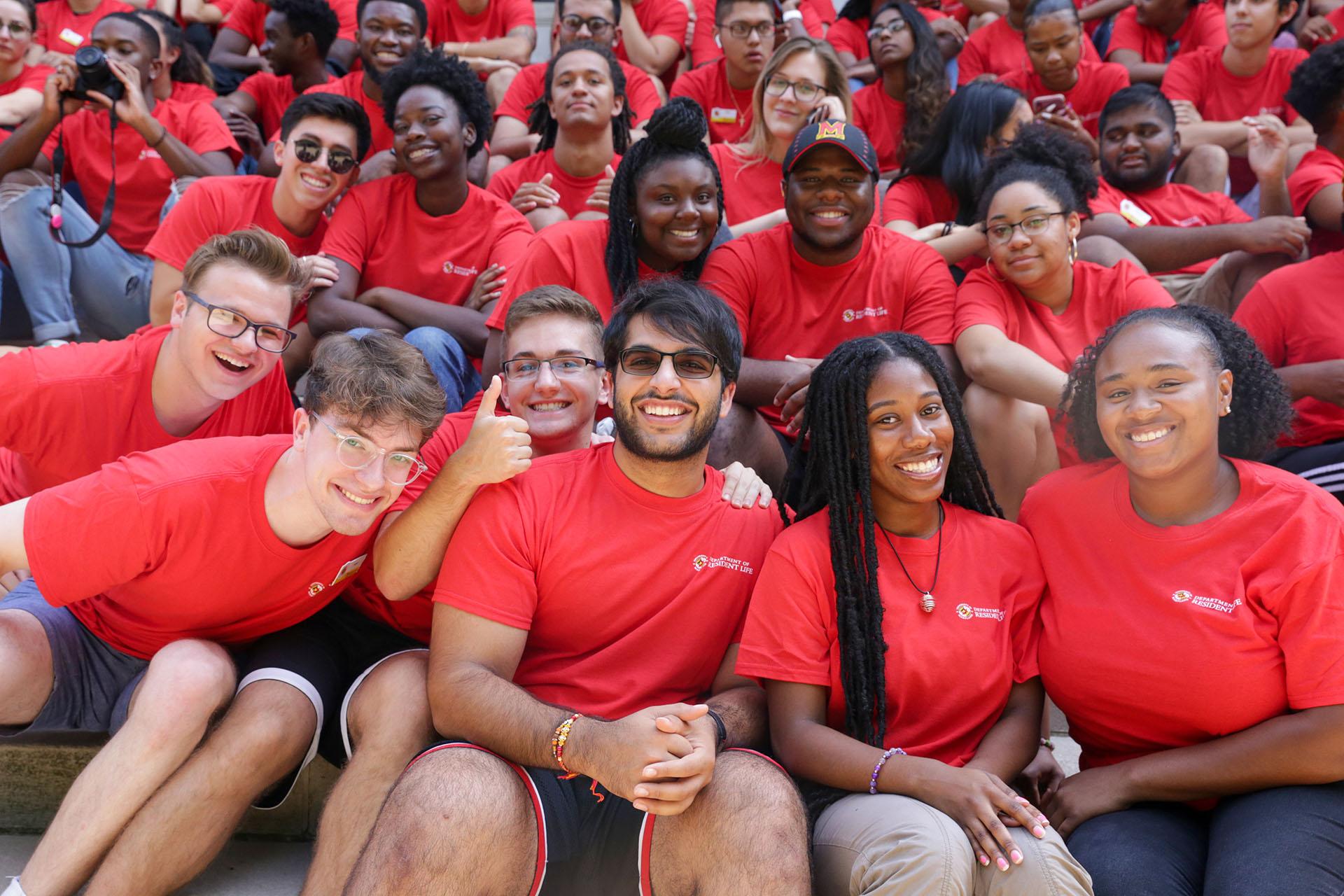 group of resident assistants in matching red shirts