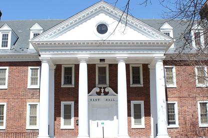 Exterior of Kent Hall, a brick building with four large white pillars and a triangular pediment.